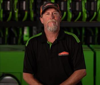 Man with goatee and SERVPRO Hat and Shirt